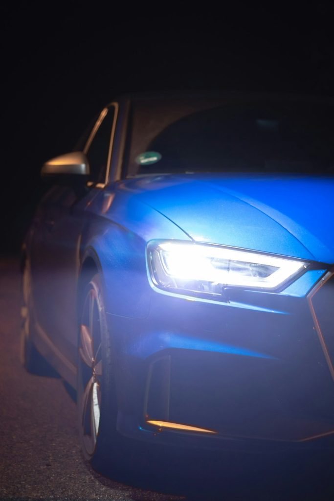 Blue Audi RS3 headlights in the dark